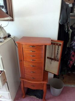 Very nice tall jewelry box 8 drawers, top opens with mirror and both side pieces open