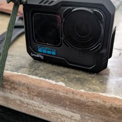 Go Pro With Extra Batteries And Charger