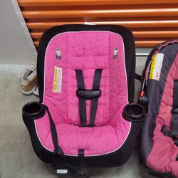 2 Car Seats One Big One Smaller