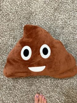 brown plush throw pillow shaped like the iconic pile of poo emoji,