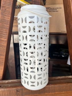 Outdoor metal candle holder