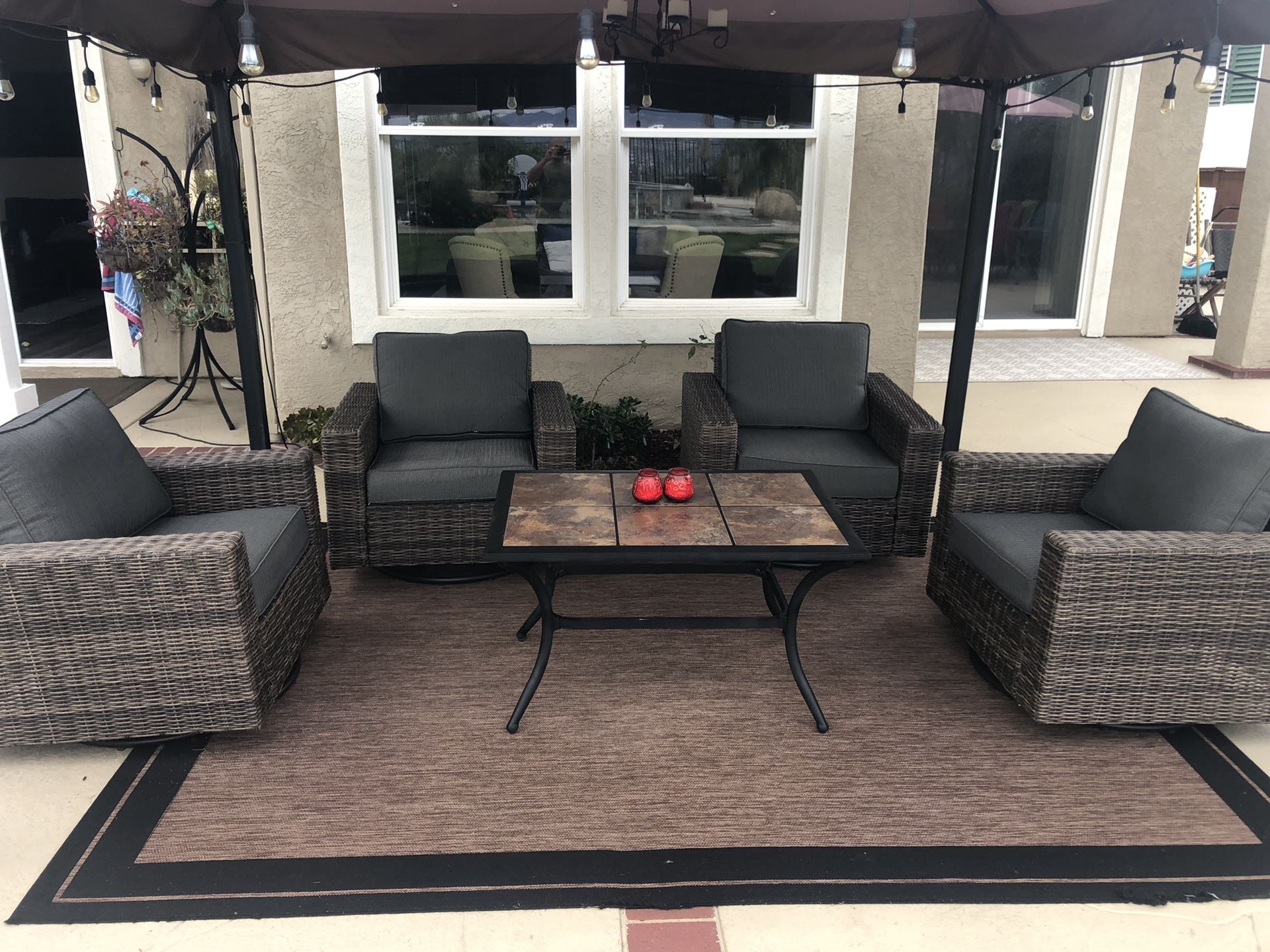 Outdoor patio furniture. Wicker Swivel Glider 4-Chairs Set