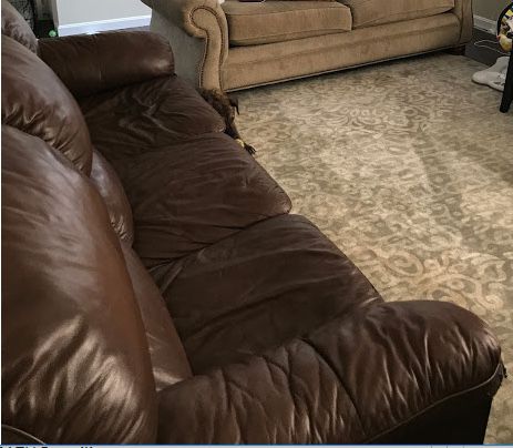 Large brown leather couch
