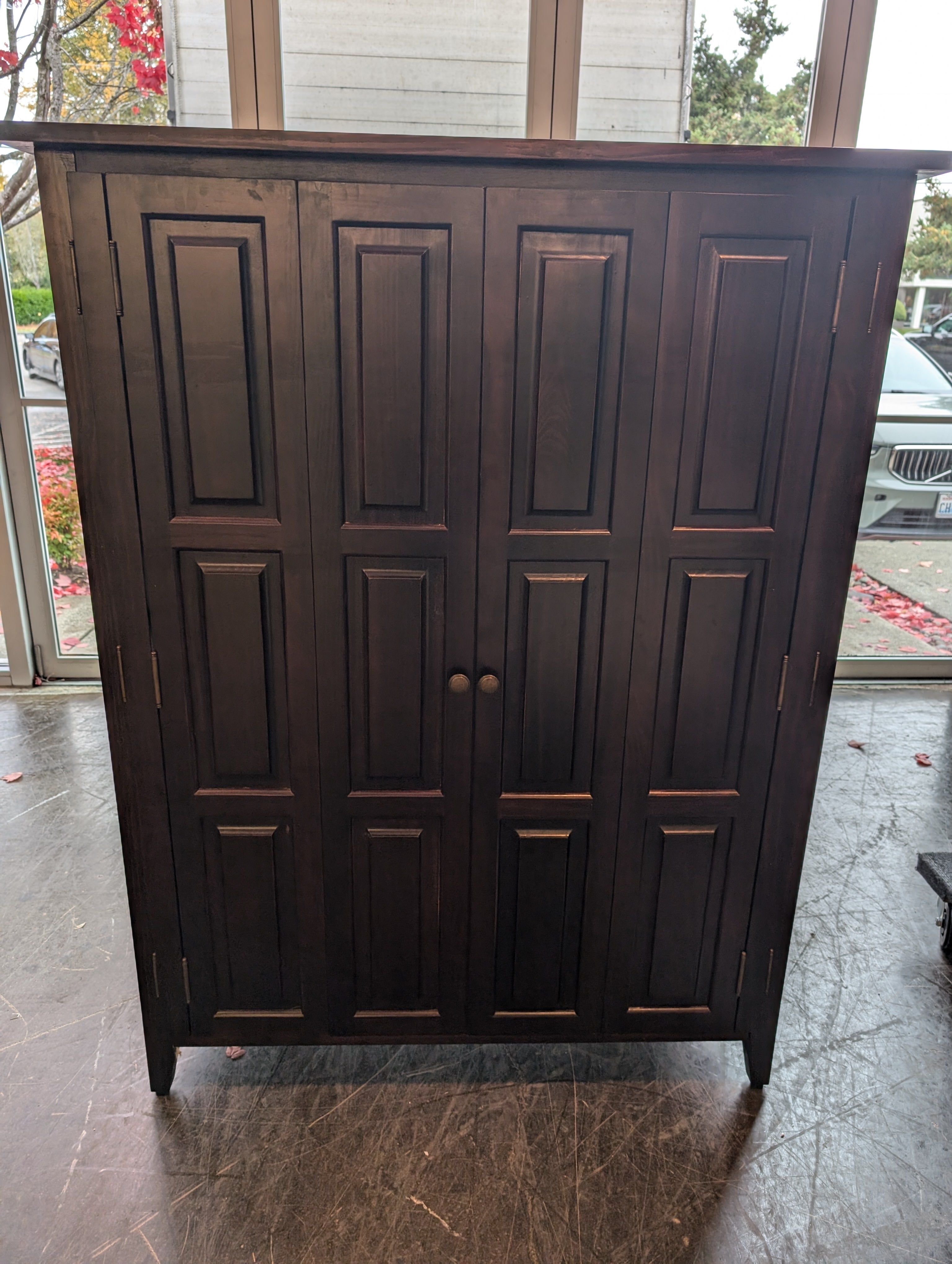 Dark Wood Entertainment center with Paneled Doors