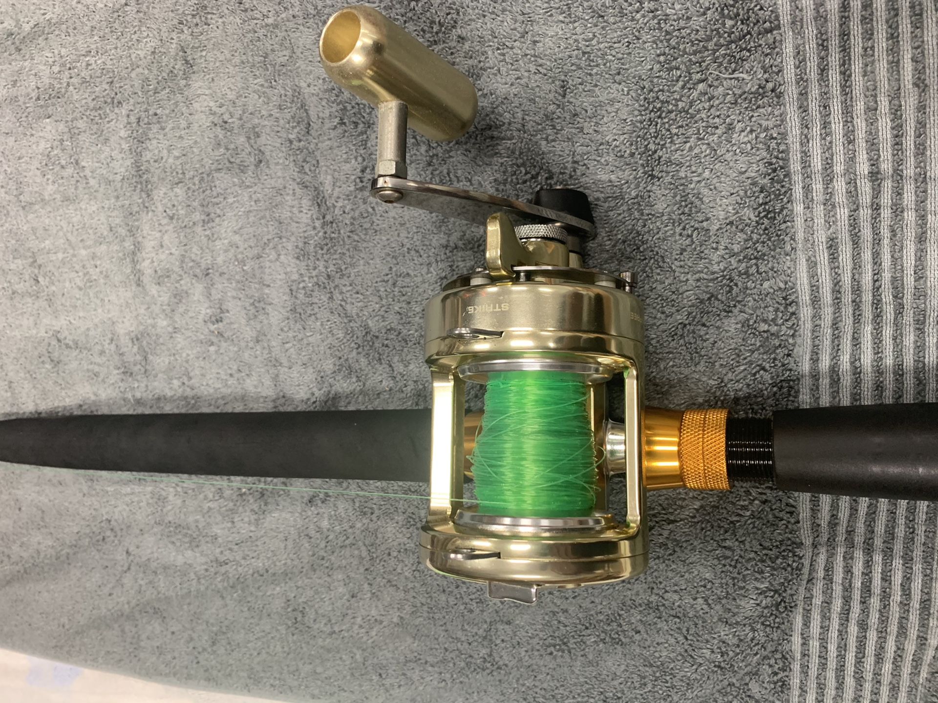 Okuma Titus TG 15 II Gold reel with Baitcaster rod combo