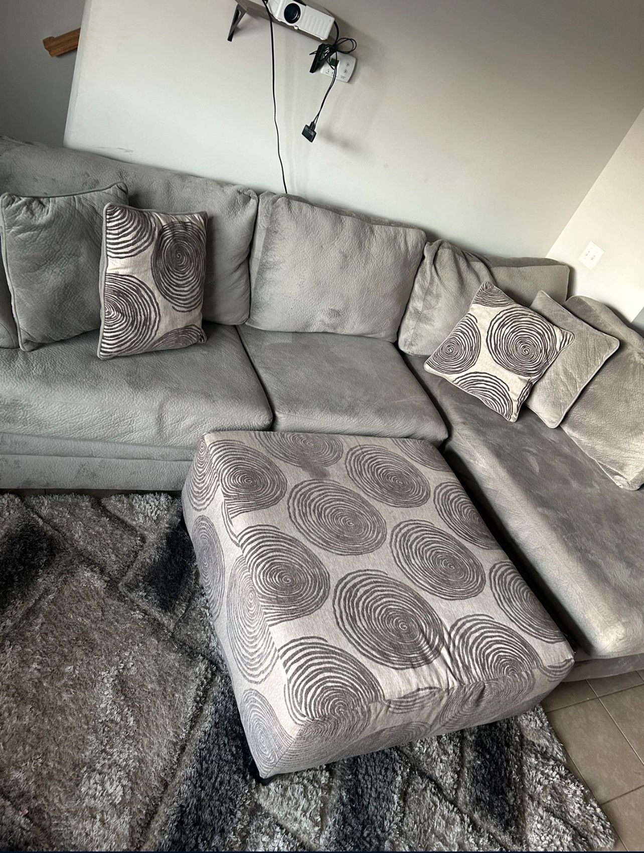 Sectional couch with ottoman 
