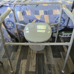 Drive Bariatric Commode Chair - Toilet With Arms. Supports Up To 650 Lbs. Can Be Positioned Over A Regular Toilet  Or Used As Portable Toilet 
