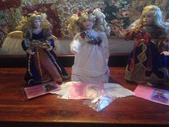 Beautiful like new angel porcelain doll collection. $10 each or 27 for the set. Great for Christmas