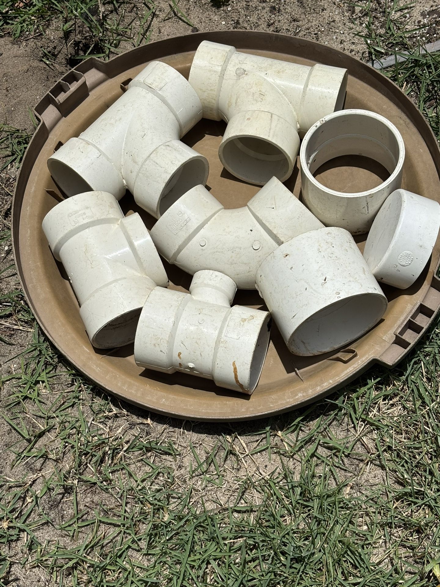 Plumbing Drain Line Fittings Pictured.