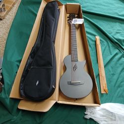 Enya Nova GO carbon fiber guitar 1/2