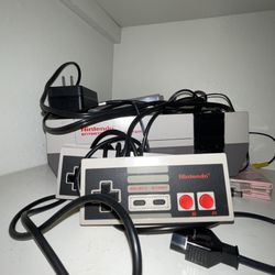 Nintendo With 2 Controllers 2 Games And Original Box Not Pictured. Working Condition 
