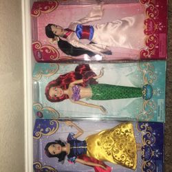 Vintage Disney store dolls 