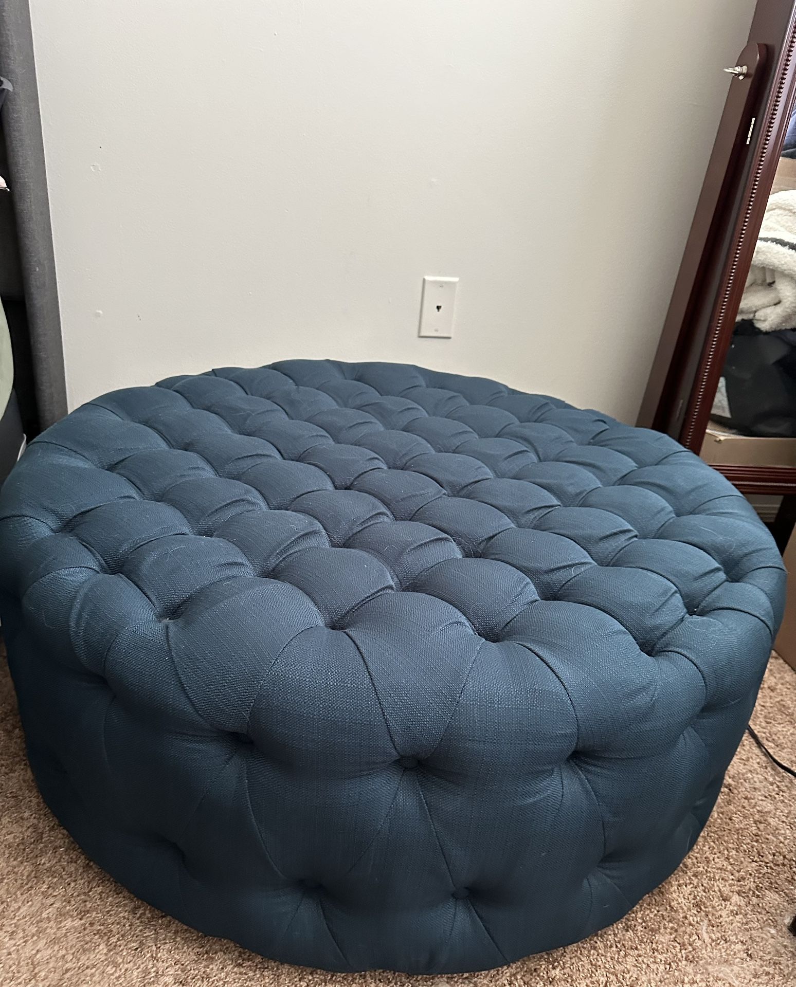 Upholstered Button-Tufted Round ottoman