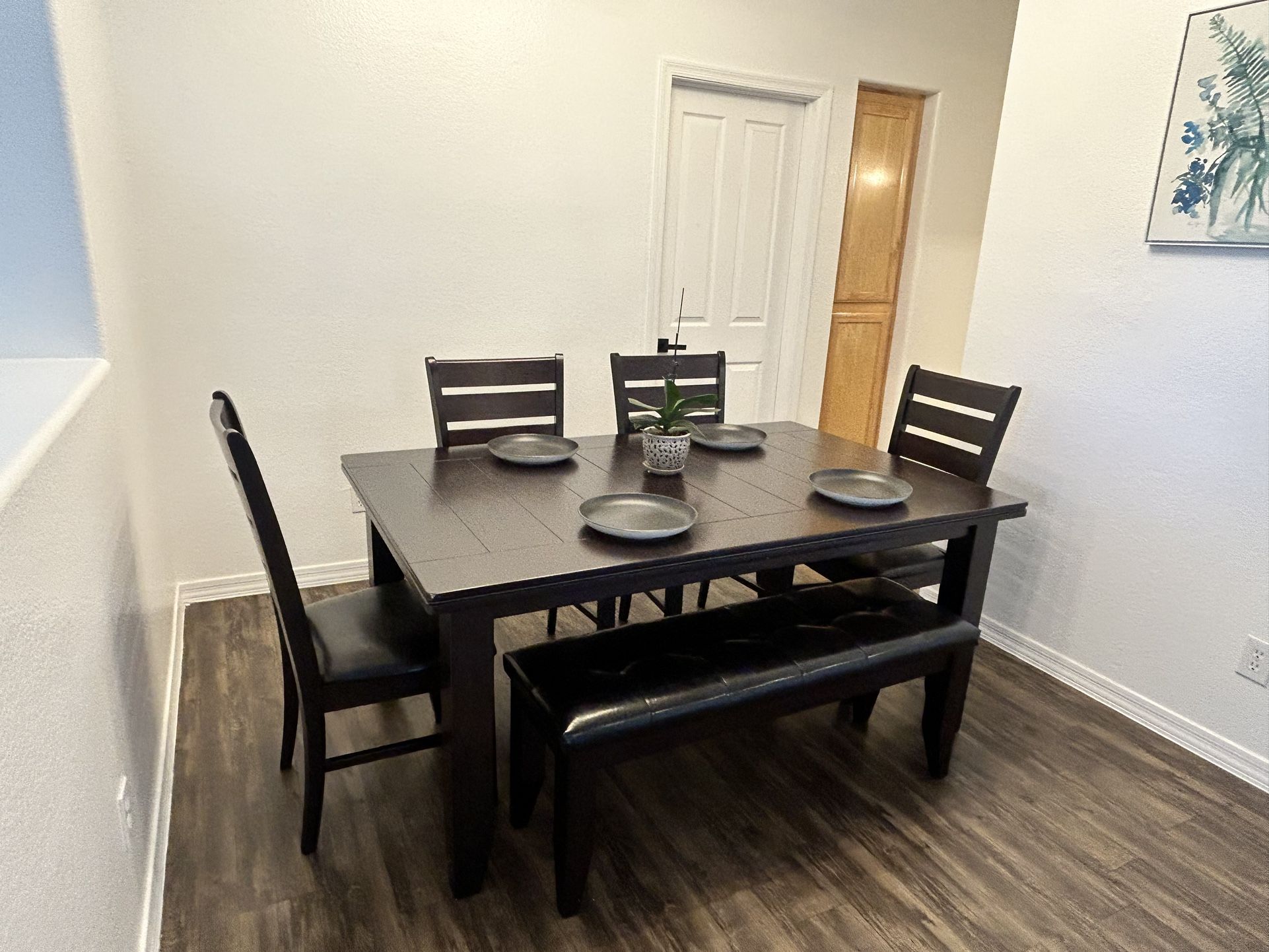 Dark Wooden Table Set With A Dining Bench