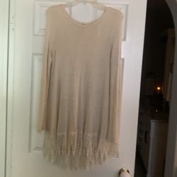 Sheer sweater with fringe