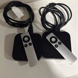 2 Apple TV units with remote controls 