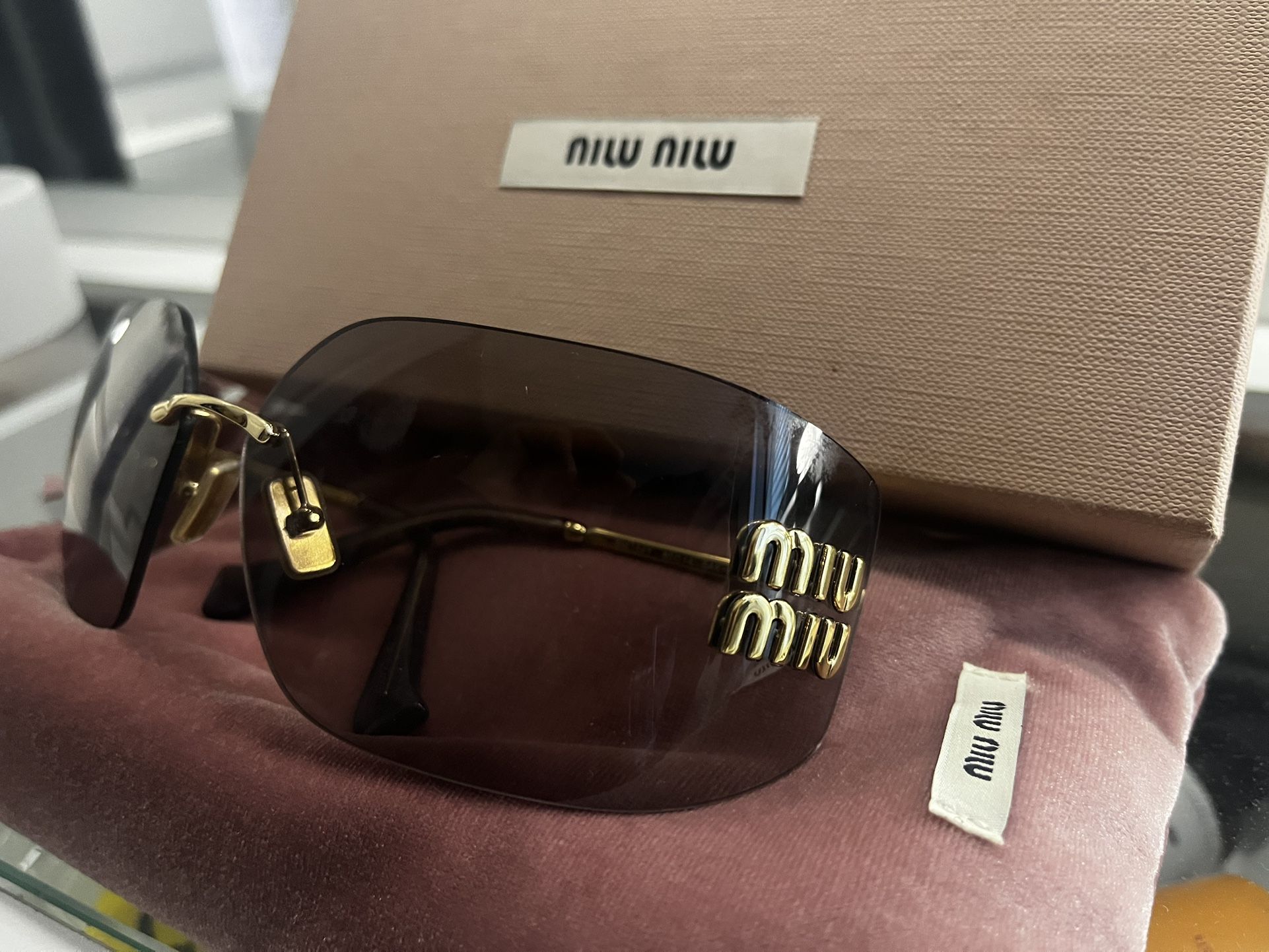 Miumiu Sunglasses