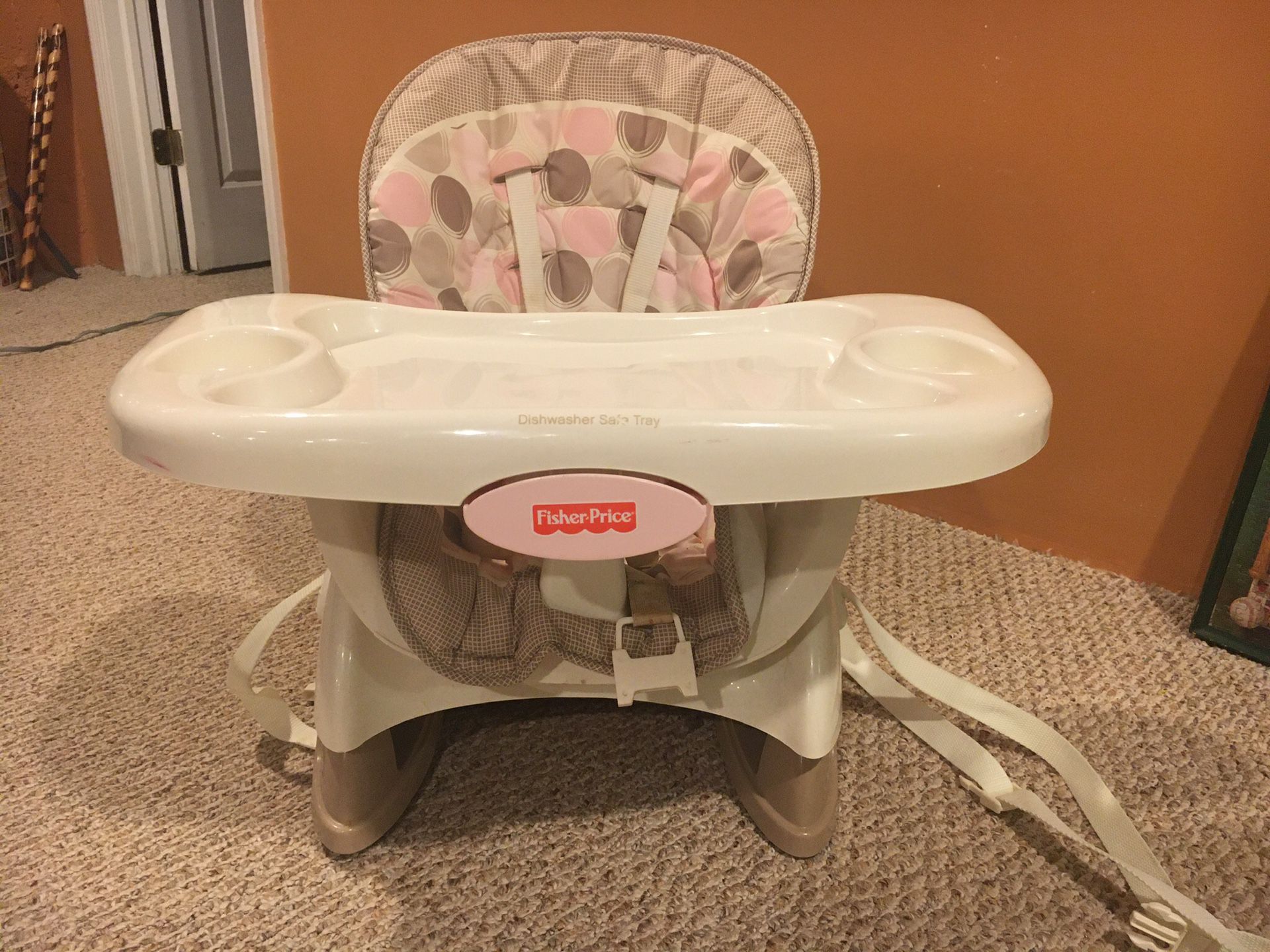 Booster seat/high chair..fisher price..spacesaver