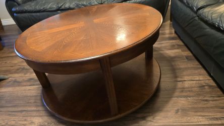 Round, two-tier wooden accent or coffee table