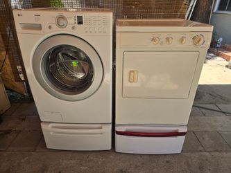 LG Tromm Washer And Frigidaire Gas Dryer