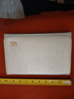 Brand new  silver clutch bag