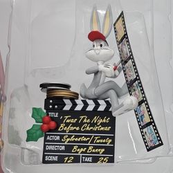 New Looney Tunes Bugs BUNNY Figure CHRISTMAS ORNAMENT movie Camera Film Matrix 

Vintage Looney Tunes Christmas Ornament, Bugs Bunny w/ Movie Equipmen