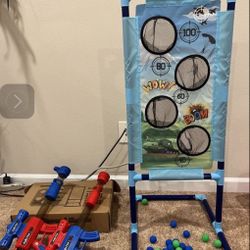 Pressure toy gun with target board