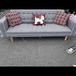 Futon, elegant excellent condition lightly has been used. No stain rips burns pet free falls into a bed.