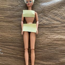 Blonde Barbie doll with red earrings- jointed body 