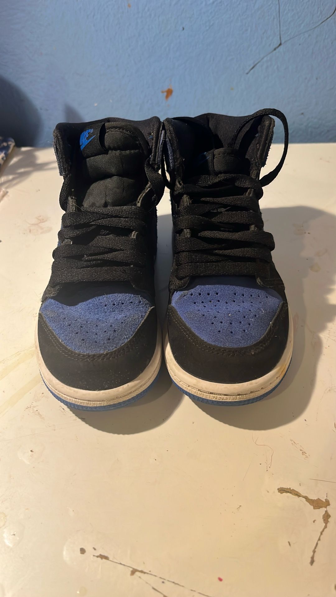 blue and black Jordan 1 Retro High OG