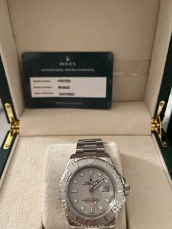 PRE-OWNED ROLEX YACHTMASTER PLATINUM AND STAINLESS STEEL AUTOMATIC