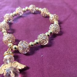Angel Charm Bracelet Gold Pink In Color