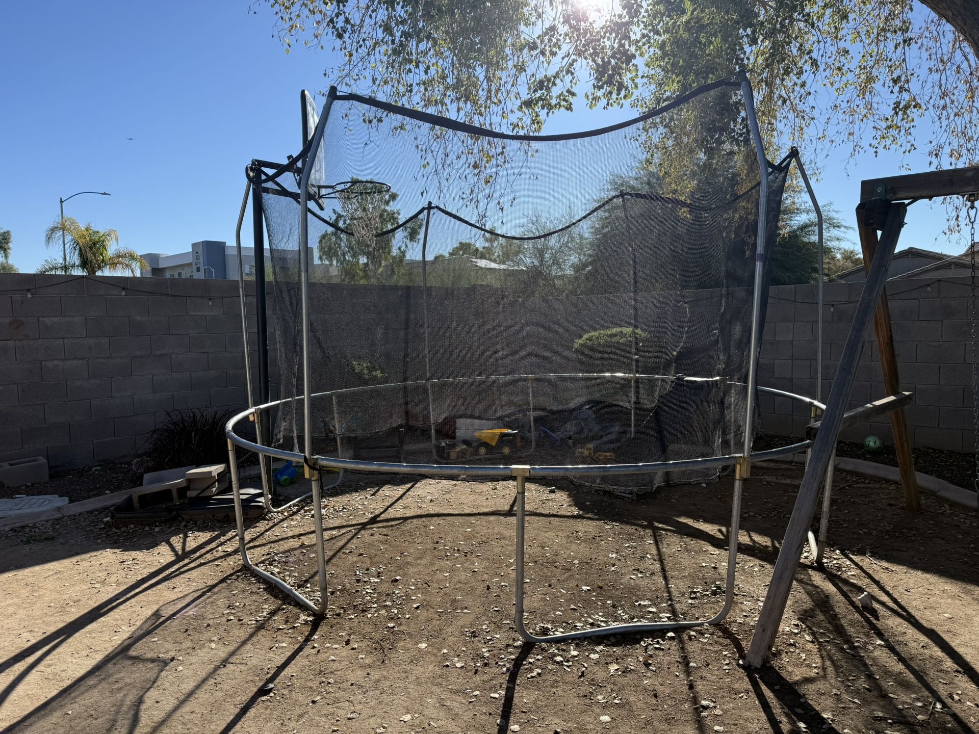 Trampoline and Basketball Hoop