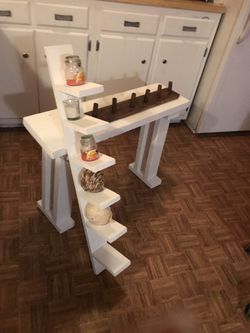 Entryway bench with shelving and coat rack