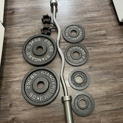 ROGUE Metal Weights With Basic Curling Bar 2x25, 2x5 And 2x2.5 Lbs. Collars Included.