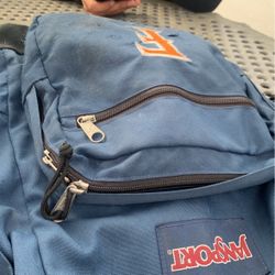 ripped backpack from the trash