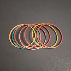Set Of 7 Multicolored Stackable Bangle Bracelets Plastic & Metal, Opening Size 2 1/4" For Small Or Extra Small Hands & Wrists 10 SETS IN STOCK