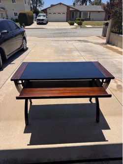 Computer desk with black glass top 48” L x 23.5” W x 30.5” H