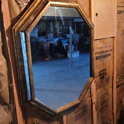 Large octagonal wall mirror with wood frame