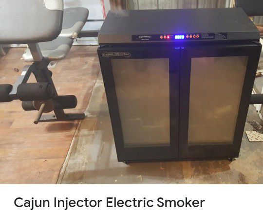 CAJUN I INJECTOR ELECTRIC SMOKER!! CAN DELIVER! GENTLY USED ASKING $75 CAN DELIVER!! WORKS GREAT!! ASKING $75