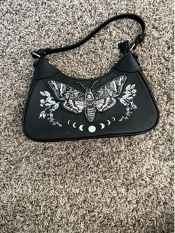 Small shoulder bag with moth