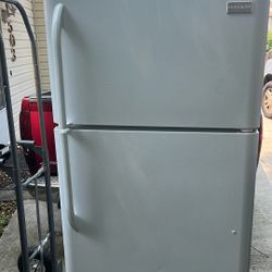 A Nice White Frigidaire Refrigerator Works Fine