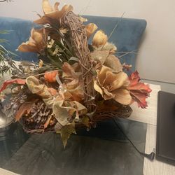 Artificial Flowers arranged in a Basket