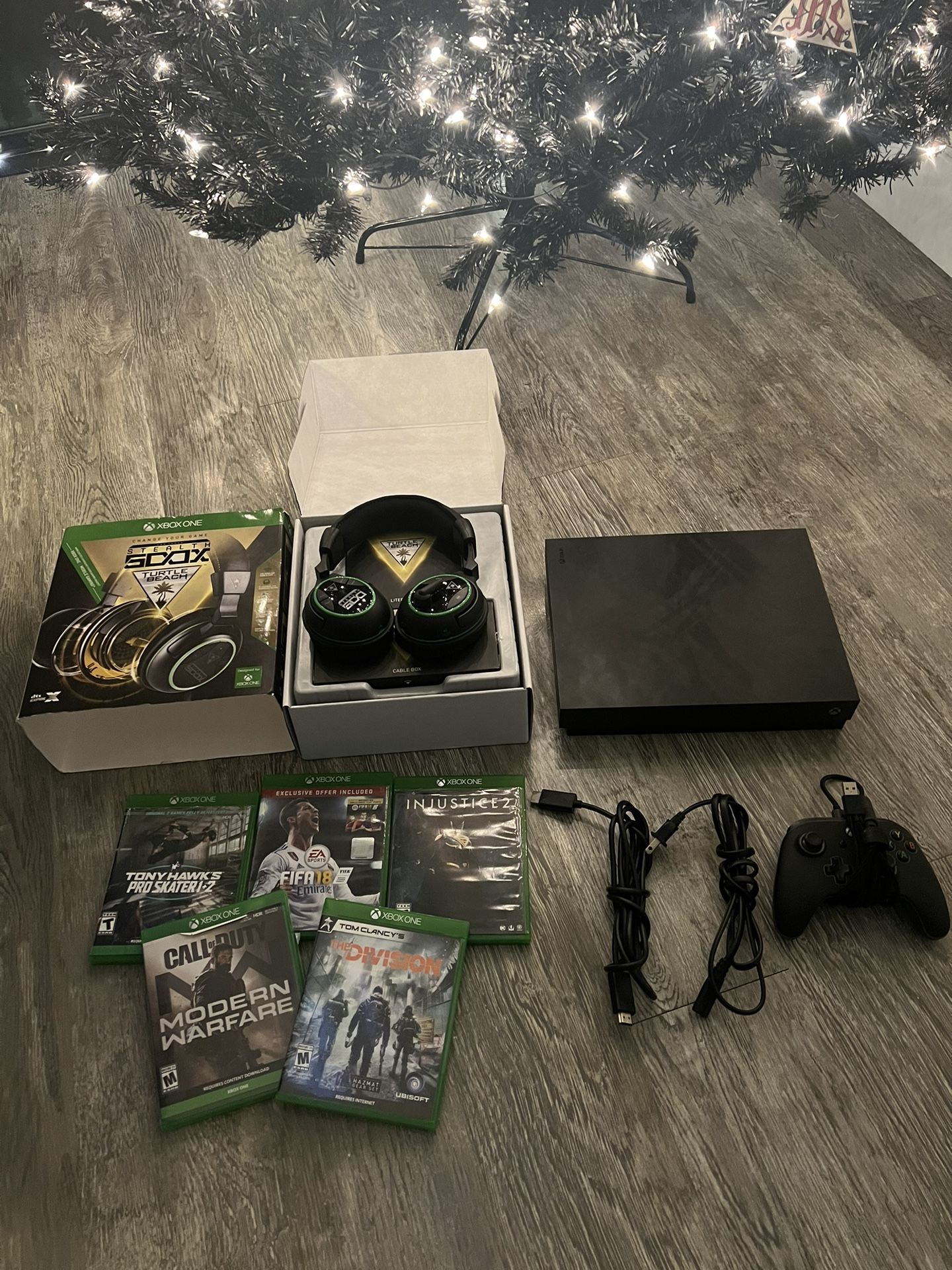Xbox One X with Headset, Controller, And 5 Games!