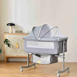 Brand-new baby bassinet in its box, for only $45.