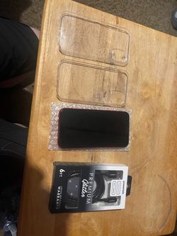 iPhone 11 unlocked with 2 cases and new charging cord