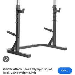 Squat Rack And Weight Plates 