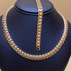 Brand new Jewelry set. This is a tri-color herringbone braided chain necklace and bracelet.  Tri-color bracelet features a yellow gold, rose gold, and