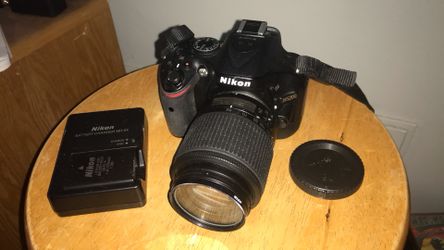 Nikon D5200 with lens, charger and extra battery