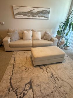 Couch and ottoman with rug set